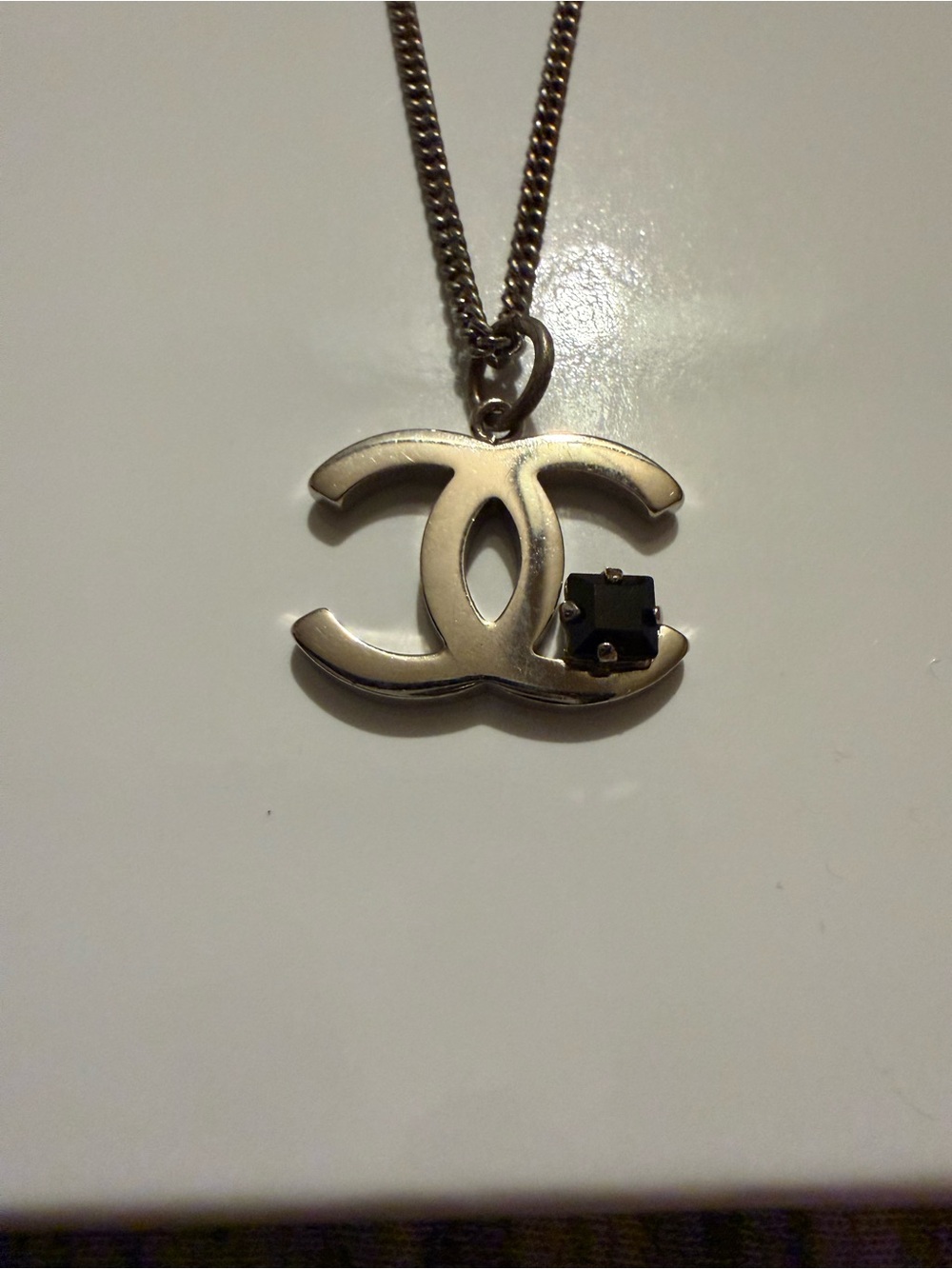 CHANEL Silver Double C Pendant Necklace with Black Stone